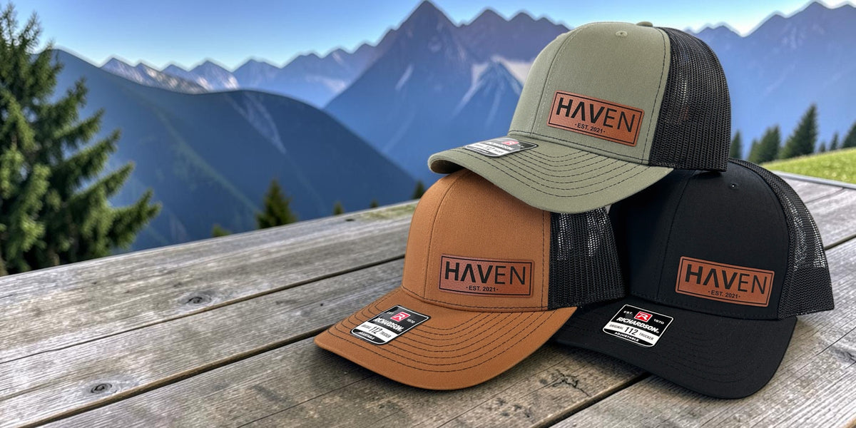 Bulk order of custom Richardson 112 company hats with engraved leather patches