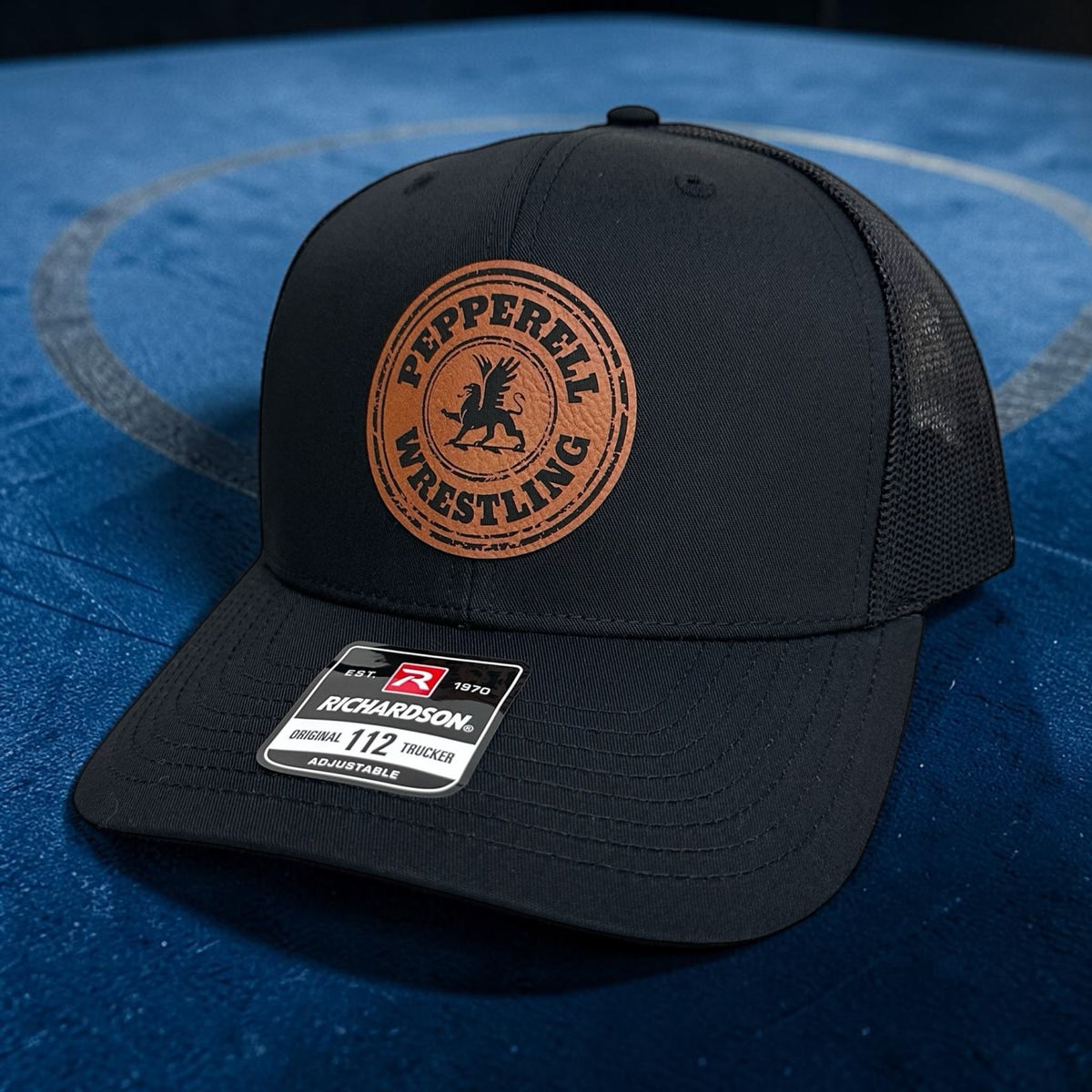 Solid Black Richardson 112 company hat with custom leather patch.