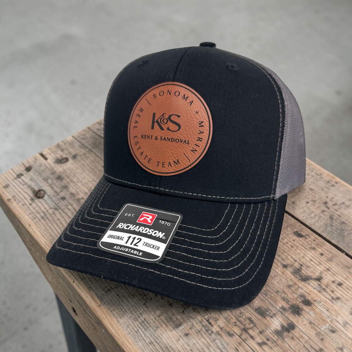 Custom Richardson 112 company hat with engraved leatherette logo patch.